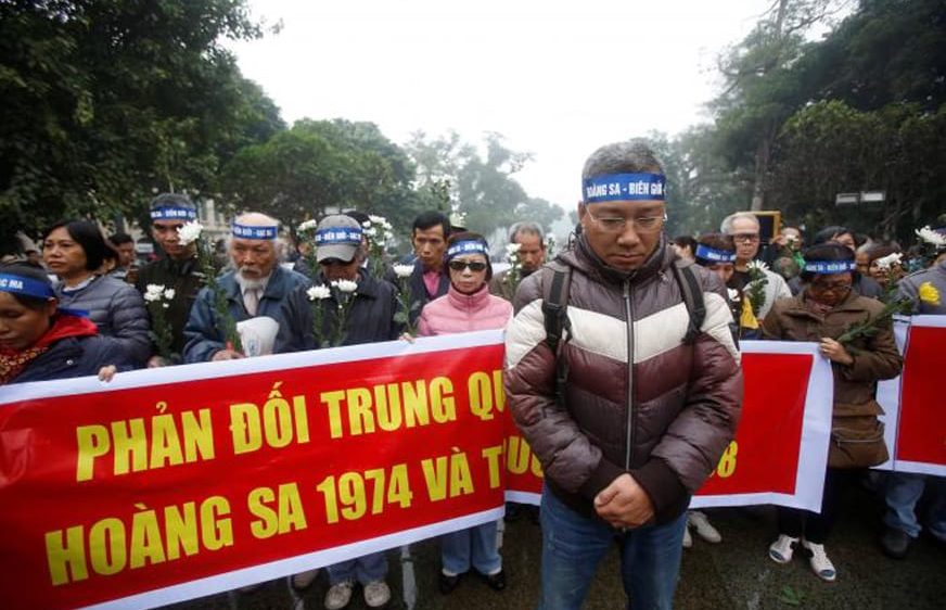 People take part in an anti-China protest to mark the 43th anniversary of the China's occupation of the Paracel Islands in the South China Sea in Hanoi