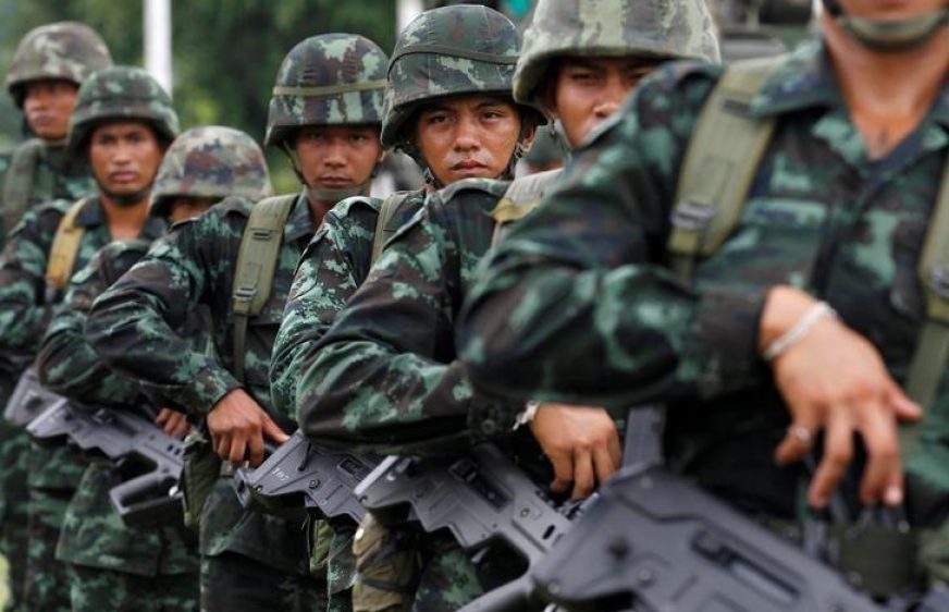 Thai soldiers attend a morning training at military barracks in Prachin Buri outside Bangkok