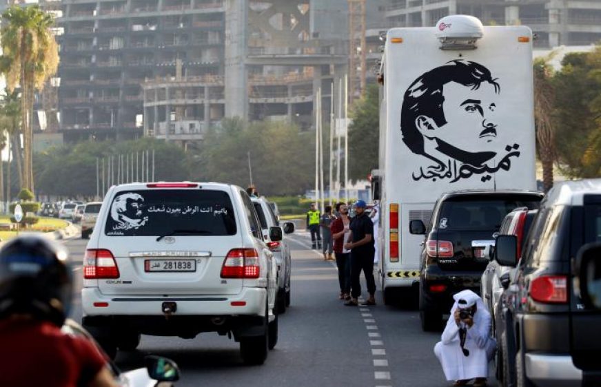 Painting depicting Qatar’s Emir Sheikh Tamim Bin Hamad Al-Thani is seen on a bus during a demonstration in support of him in Doha