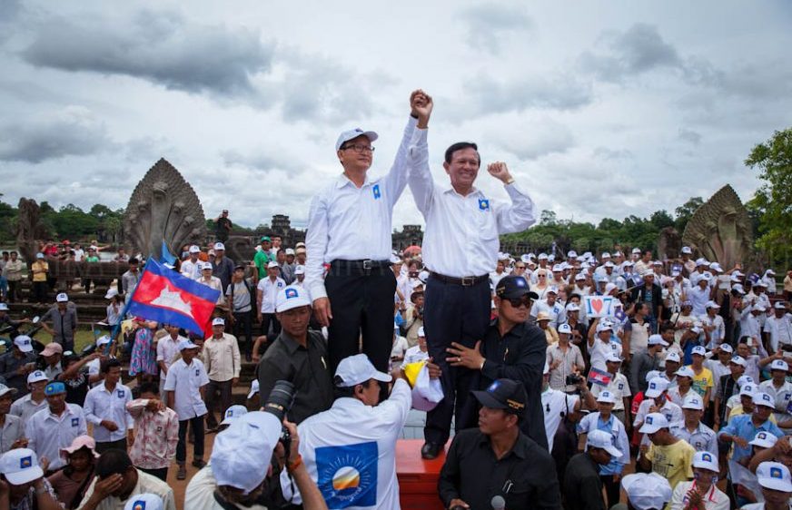 CNRP opposition leaders Kem Sokha and Sam Rainsy in front of Angkor Wat in Siem Reap. Jul. 24, 2013 ©Erika Pineros