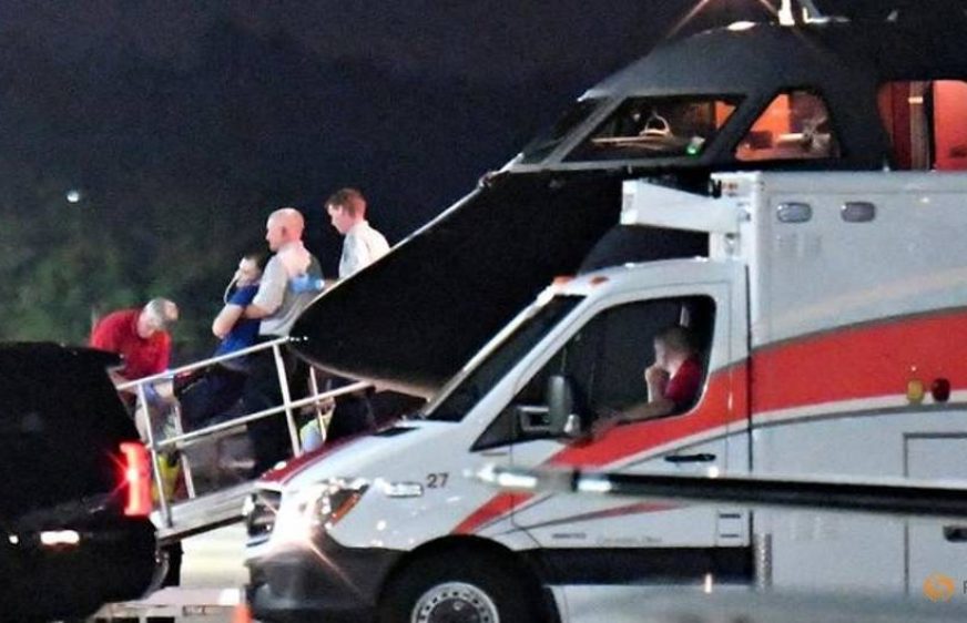 a-person-believed-to-be-otto-warmbier-is-transferred-from-a-medical-transport-airplane-to-an-awaiting-ambulance-at-lunken-airport-in-cincinnati-9