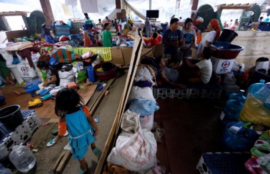 Evacuated residents rest at evacuation centre in Iligan