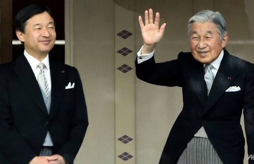 japan-s-emperor-akihito-r-waves-to-well-wishers-as-crown-prince-naruhito-l-looks-on-during-their-new-year-greetings-in-tokyo-january-1-2015-1497372522930-4